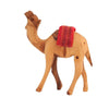 Image of Wooden camel toy with a red saddle on a white background
